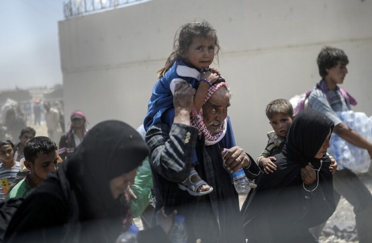 Turkish guards firing at Syrian refugees, group says