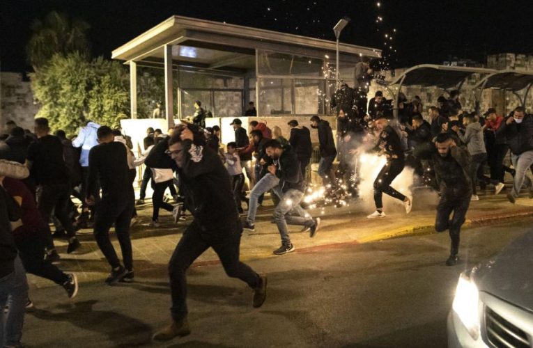 Dozens of Palestinians injured in police clashes as Jewish extremists chanting ‘Death to Arabs’ march in Jerusalem