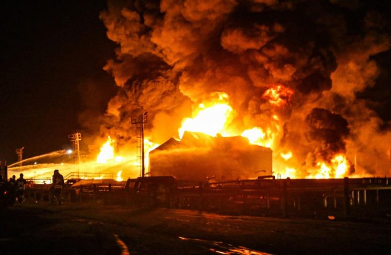 Firefighters battle massive fire at Iranian oil refinery