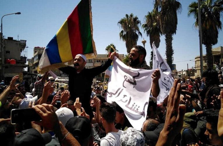 Rare protests flare in regime-held Syria as Assad seeks international rehabilitation