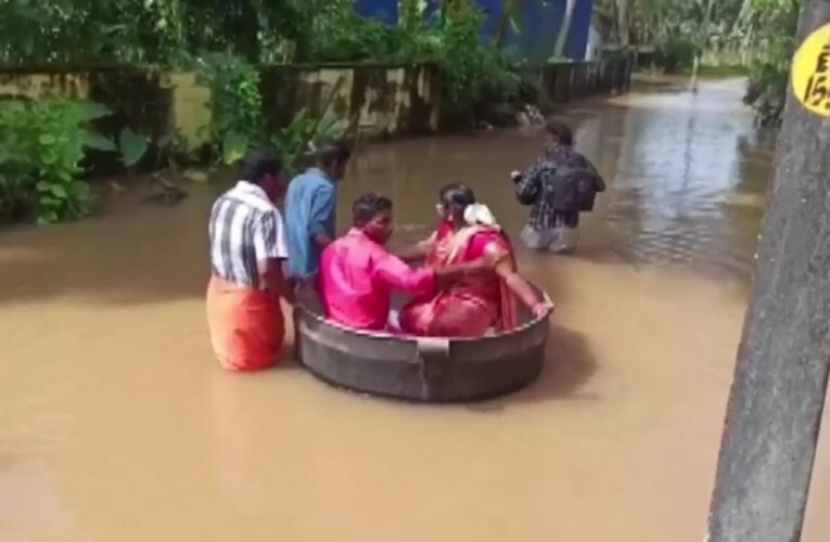 شاهد.. زوجان يطوفان على سطح المياه لحضور حفل زفافهما في قدر طهي كبير